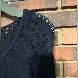 🛍️ bebe  super stretch top with sheer sleeves and top of the back.